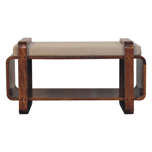 Banc en manguier massif teinte châtaigne, cadre arrondi en boucle, coussin en lin, étagère basse ouverte
