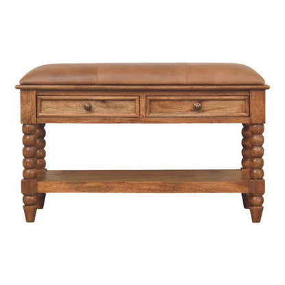 Banc en manguier massif teinte ambre, assise en cuir, deux tiroirs, tablette basse et pieds bobine