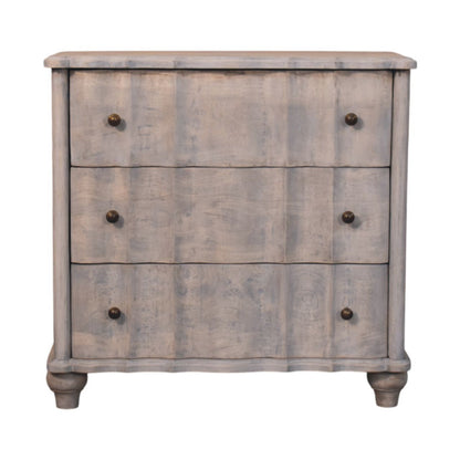 Commode en manguier massif finition délavée vintage, façade à panneaux, tiroirs et pieds galbés