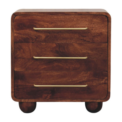 Commode arrondie en manguier massif teinte brun rouge, 3 tiroirs à poignées laiton et pieds cylindriques
